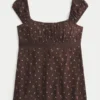 Enkel babydoll-top i satin med knytband Enkel babydoll-top i satin med knytband