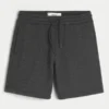 Fleece-shorts med ikon ovanför knäet Fleece-shorts med ikon ovanför knäet