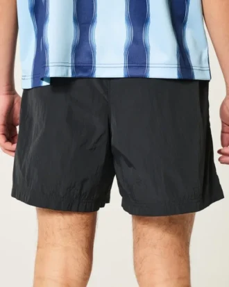 Fotbollsshorts i midilängd
