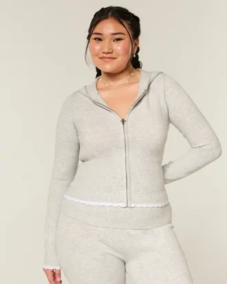 Gilly Hicks Hoodie med zip och vågig kant