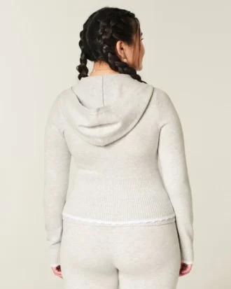 Gilly Hicks Hoodie med zip och vågig kant