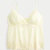 Glittrande broderad babydoll-top