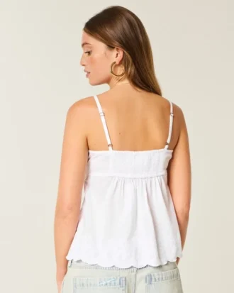 Glittrande broderad babydoll-top
