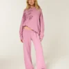 Glittrande rosgrafik Sweatpants med vida ben