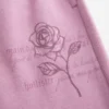 Glittrande rosgrafik Sweatpants med vida ben