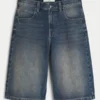 Halvlånga byxor i mediumtvättad denim