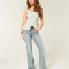 Högmidjade jeans med medium tvätt och utsvängda ben Högmidjade jeans med medium tvätt och utsvängda ben