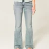 Högmidjade jeans med medium tvätt och utsvängda ben Högmidjade jeans med medium tvätt och utsvängda ben