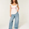 Justerbar midja Låg midja Mediumtvättade baggy jeans Justerbar midja Låg midja Mediumtvättade baggy jeans