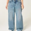 Justerbar midja Låg midja Mediumtvättade baggy jeans Justerbar midja Låg midja Mediumtvättade baggy jeans
