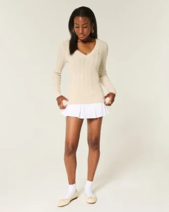 Kabelstickad ikonisk V-ringad tröja Kabelstickad ikonisk V-ringad tröja