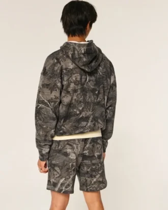 Kamouflagefleece-shorts ovanför knäet