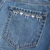 Låg midja Broderad rosett Denim Mini Skort Låg midja Broderad rosett Denim Mini Skort
