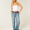 Låg midja, medium tvätt, baggy jeans med stjärngrafik