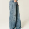 Låg midja, medium tvätt, baggy jeans med stjärngrafik