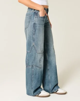 Låg midja, medium tvätt, baggy jeans med stjärngrafik