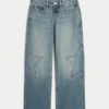 Låg midja, medium tvätt, baggy jeans med stjärngrafik