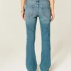 Låg midja, medium tvätt, bootcut-jeans med nitar Låg midja, medium tvätt, bootcut-jeans med nitar