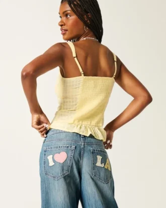 Låg midja, medium tvätt Los Angeles grafiska baggy jeans