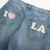 Låg midja, medium tvätt Los Angeles grafiska baggy jeans Låg midja, medium tvätt Los Angeles grafiska baggy jeans