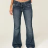 Låg midja, mörk tvätt, bälte, bootcut-jeans Låg midja, mörk tvätt, bälte, bootcut-jeans