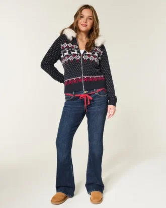 Låg midja, mörk tvätt, röda snörningar i midjan, bootcut-jeans