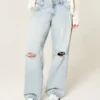 Låg midja, slitna, ljusblå baggy jeans