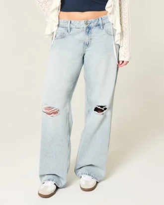 Låg midja, slitna, ljusblå baggy jeans