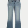 Låg midja, slitna, mediumtvättade bootcut-jeans Låg midja, slitna, mediumtvättade bootcut-jeans