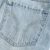 Lågmidjad miniskort i denim