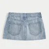 Lågmidjad miniskort i denim med broderade stjärnor Lågmidjad miniskort i denim med broderade stjärnor
