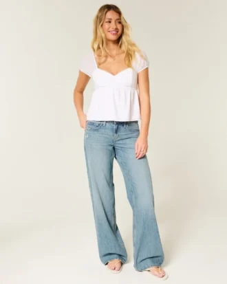 Lågmidjade baggy jeans i medium tvätt med fjärilsmotiv