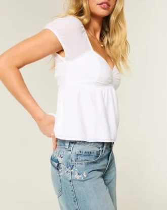 Lågmidjade baggy jeans i medium tvätt med fjärilsmotiv