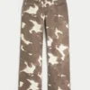 Lågmidjade baggy jeans med ko-mönster
