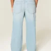 Lågmidjade baggy jeans med slitna detaljer Lågmidjade baggy jeans med slitna detaljer