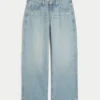 Lågmidjade baggy jeans med slitna detaljer Lågmidjade baggy jeans med slitna detaljer