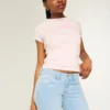 Lågmidjade bootcut-jeans med broderad stjärna Lågmidjade bootcut-jeans med broderad stjärna