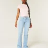 Lågmidjade bootcut-jeans med broderad stjärna Lågmidjade bootcut-jeans med broderad stjärna