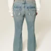 Lågmidjade bootcut-jeans med fjärilsbroderi i medium tvätt Lågmidjade bootcut-jeans med fjärilsbroderi i medium tvätt