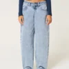 Lågmidjade, ljusblå, avsmalnande baggyjeans
