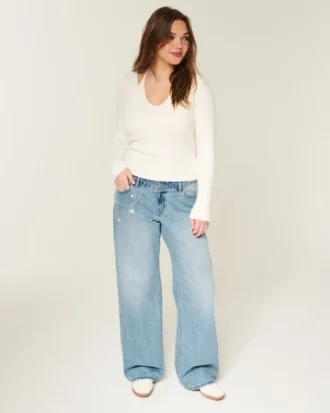 Lågmidjade, ljusblå baggyjeans med kedjebroderi