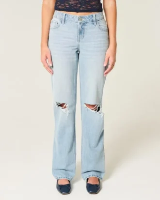 Lågmidjade, ljusblå, slitna, lösa jeans