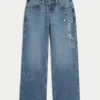 Lågmidjade, mörkblå baggyjeans med broderad text ”Class of ’26” Lågmidjade, mörkblå baggyjeans med broderad text ”Class of ’26”