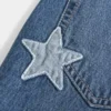 Lågmidjade, mörkblå baggyjeans med broderad text ”Class of ’26” Lågmidjade, mörkblå baggyjeans med broderad text ”Class of ’26”