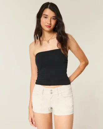 Lågmidjade poplinshorts med blommiga bakfickor