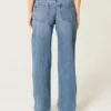 Lågmidjade, slitna jeans i medium tvätt Lågmidjade, slitna jeans i medium tvätt