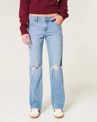 Lågmidjade, slitna jeans i medium tvätt med rak passform