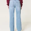 Lågmidjade, slitna jeans i medium tvätt med rak passform