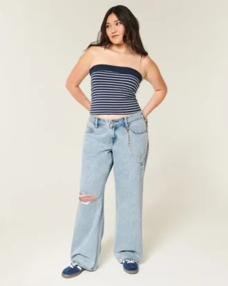 Lågmidjade, slitna, ljusblå baggy jeans
