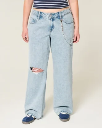 Lågmidjade, slitna, ljusblå baggy jeans